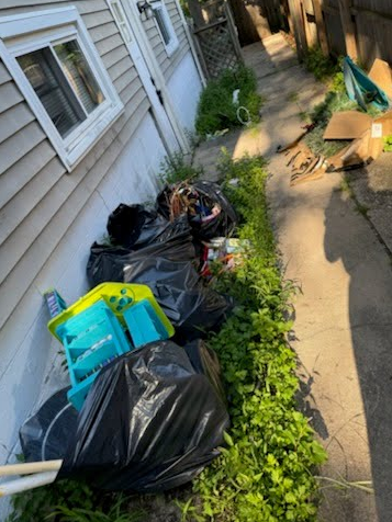 Property Cleanup in Huntington Station, NY – Trash and Yard Debris Removal (August 5) 30pear sideyard before